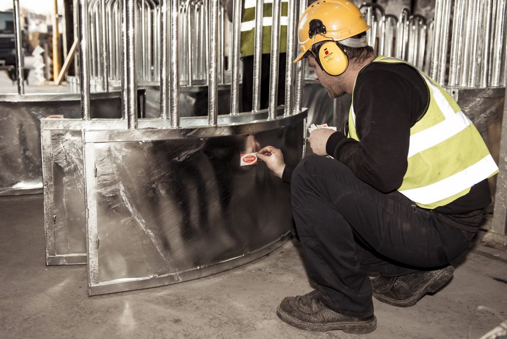 joseph ash worker labelling steel