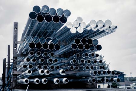 piles of steel pipes in-store