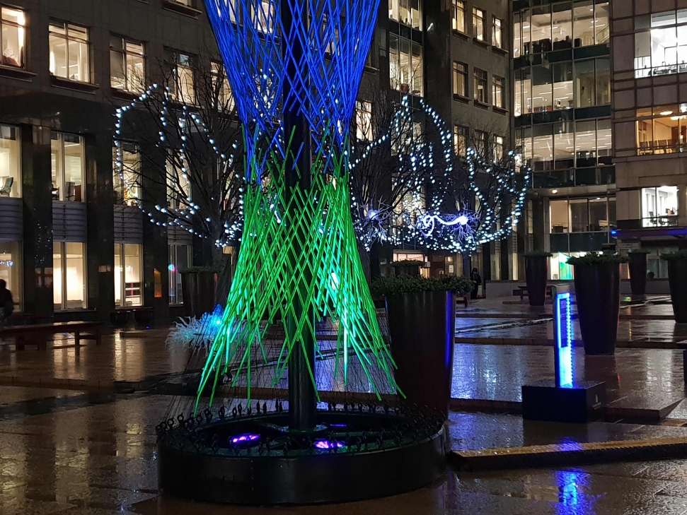 galvanised time and tide sculpture at canary wharf winter lights bottom