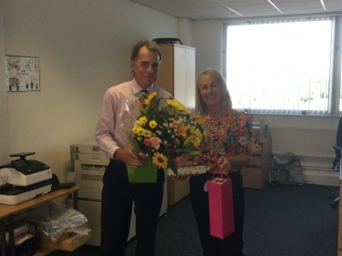 Jeanette Dixon receiving congratulations gifts