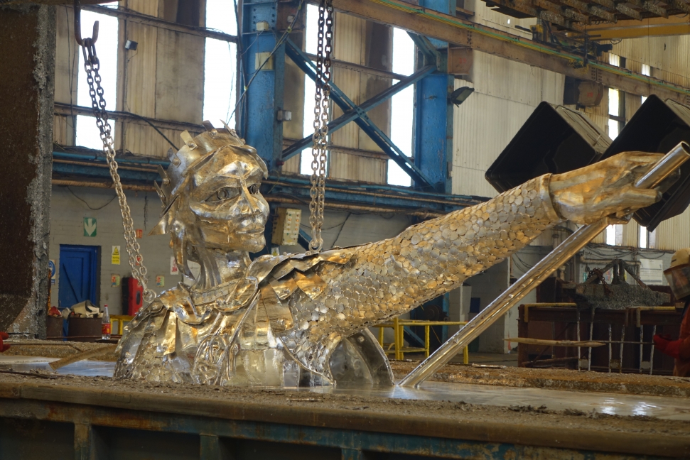 queen aethefflaed sculpture rising out of zinc bath