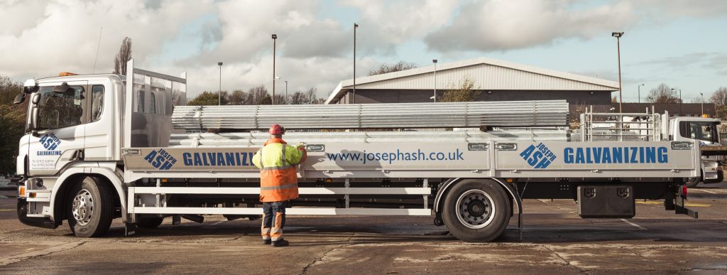 A person with a Joseph Ash Galvanizing truck