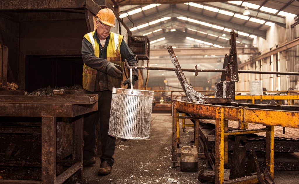 Man with spin galvanizing basket