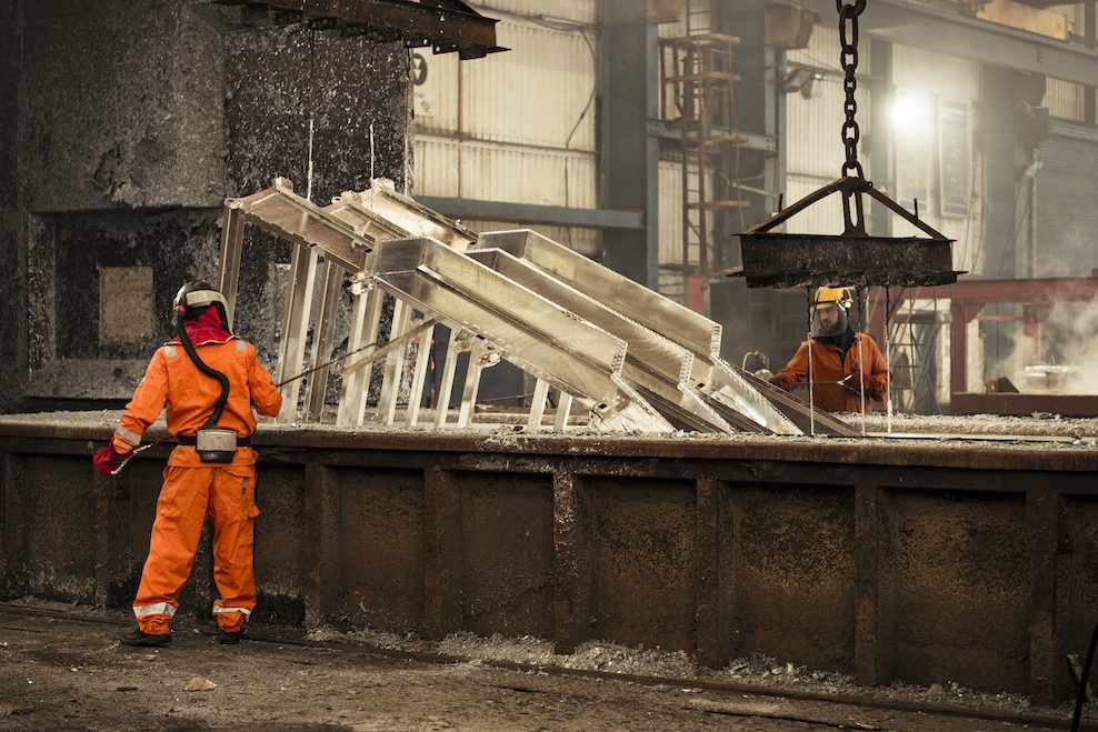 Two operatives hot dip galvanizing steel
