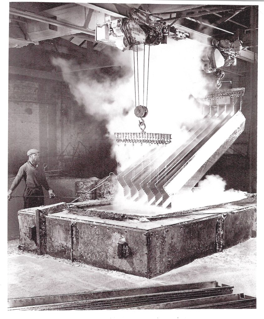 An old photo of a galvanizing operative at a Joseph Ash Galvanizing plant
